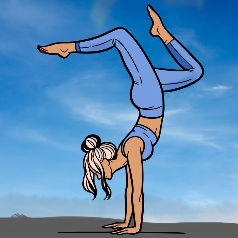 a woman doing a handstand