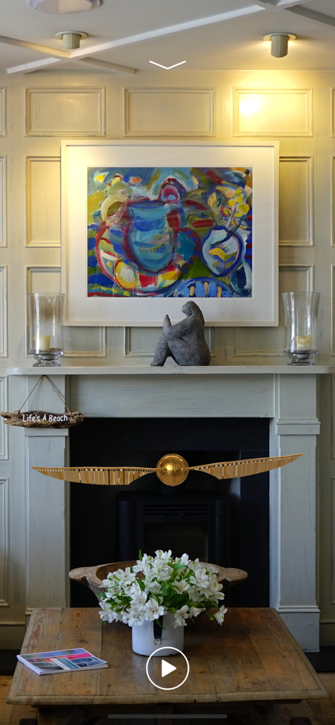 Harry Potter's  Golden Snitch - The Golden Snitch from Harry Potter hovering in a living room using augmented reality