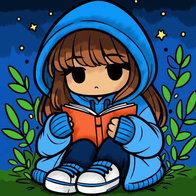 girl in oversized hoodie reading a book