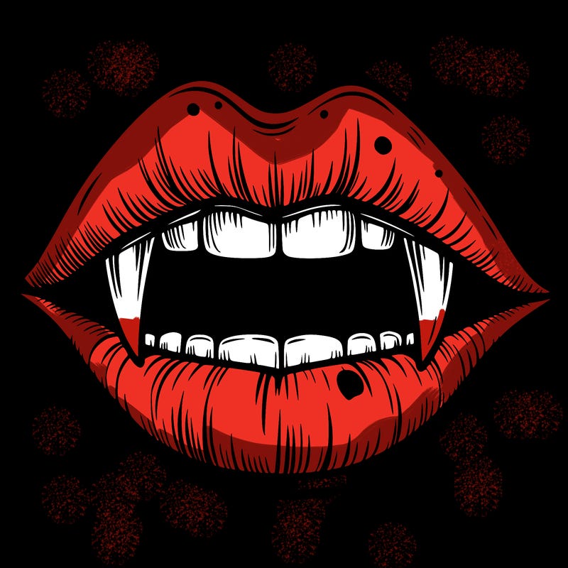 lips with vampire teeth