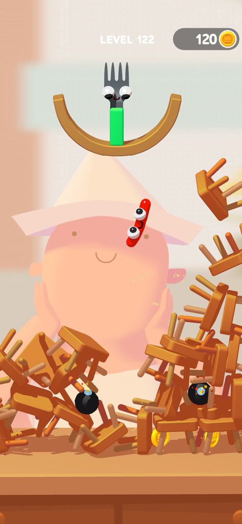 A sausage character bouncing through wooden chairs and bombs towards a fork.