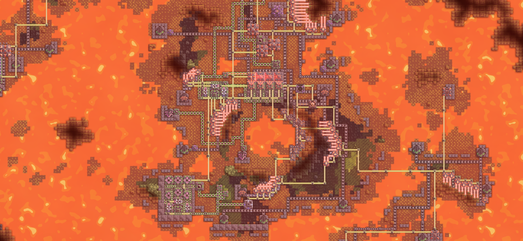 Mindustry - Top down view of complex automated supply chains and factory blocks on a volcanic terrain in Mindustry