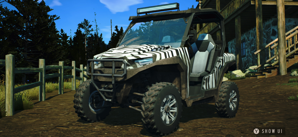 Way of the Hunter Wild America - A zebra patterned off-road utility vehicle parked near a wooden hunting lodge