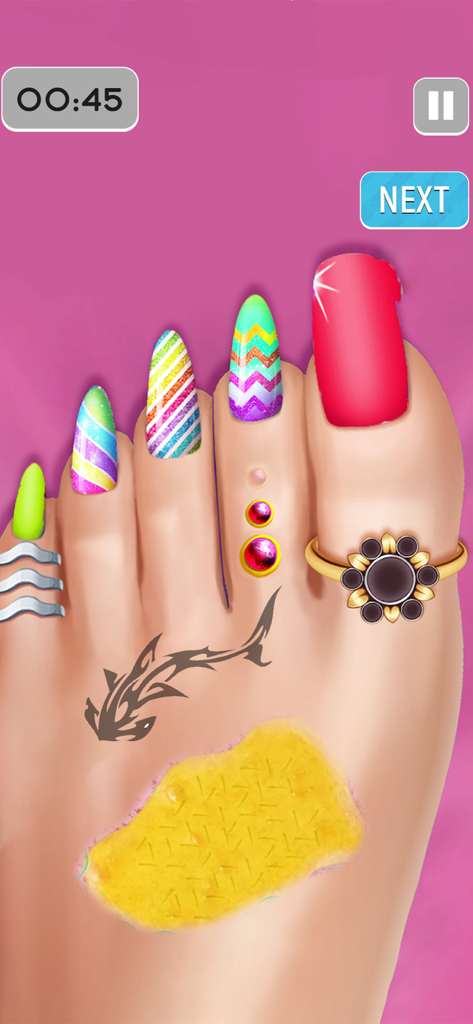 ASMR Foot Care: Doctor Games - Gameplay screen of ASMR Foot Care showing a foot with colorful decorated toenails and jewelry.