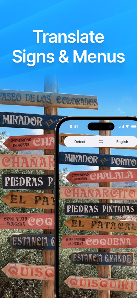 Schermata dell'iPhone che utilizza l'app Traduttore AI per tradurre segnali stradali direzionali in legno in tempo reale tramite la modalità fotocamera.
