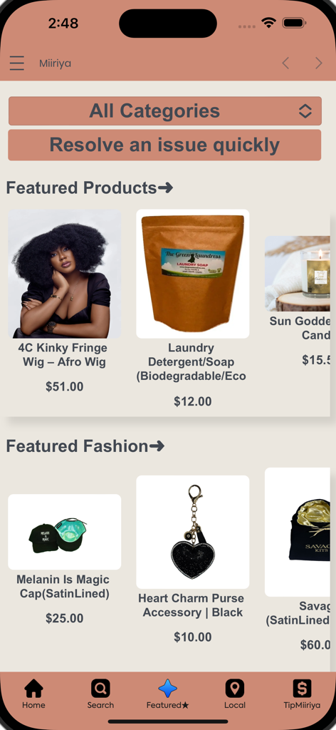 A mobile app interface for Miiriya showing featured products including a kinky fringe wig and laundry detergent, alongside featured fashion items like a melanin-themed cap and a heart charm accessory.