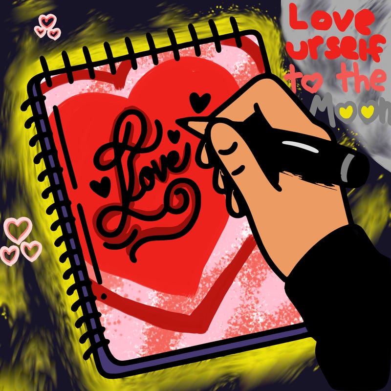 a hand writing “love” in calligraphy on a notebook