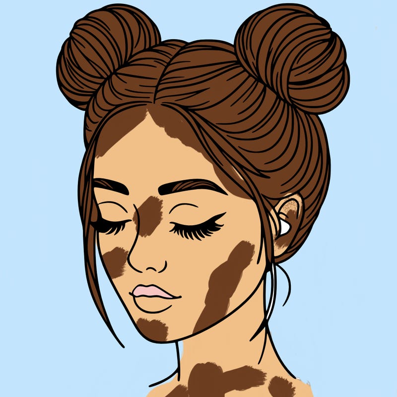 woman with hair buns