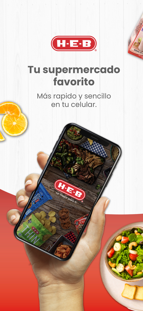 Mano sosteniendo un smartphone mostrando la interfaz de la app de supermercado mi H-E-B con productos frescos.