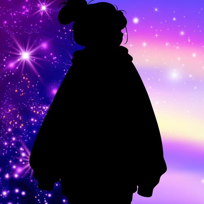 realistic girl with a oversized sweatshirt on and a bun