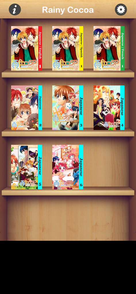 RAINY COCOA - A virtual bookshelf inside the Rainy Cocoa app displaying several digital manga volumes with bilingual language options.
