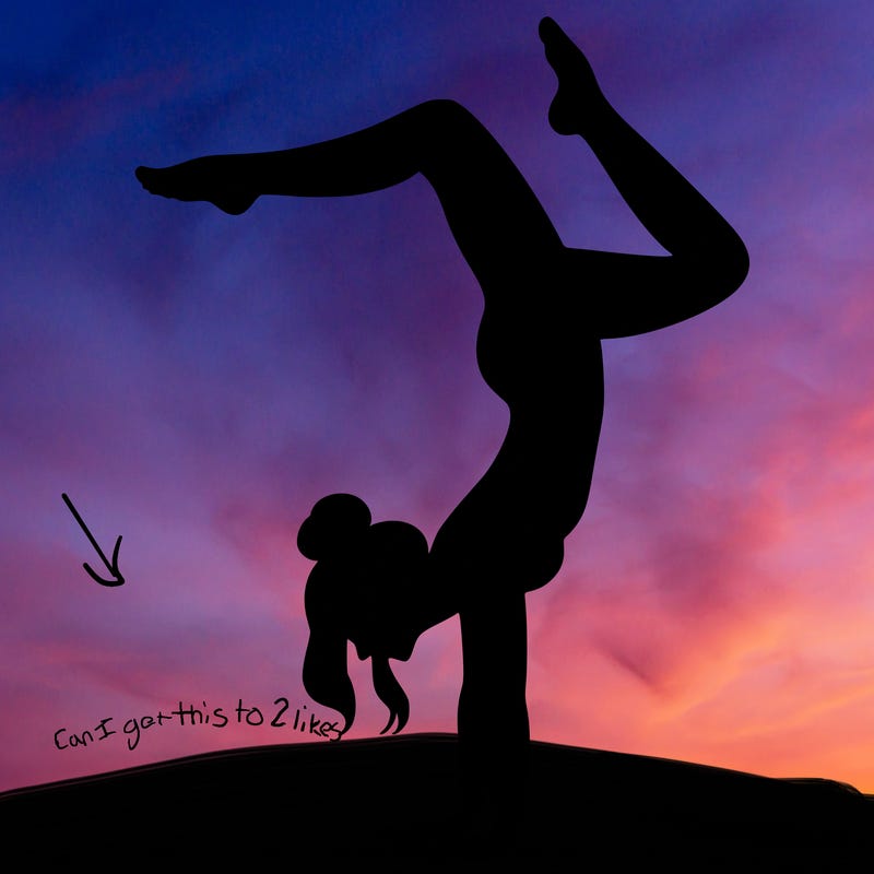 a woman doing a handstand