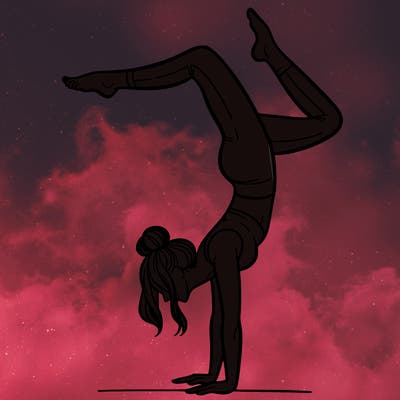 a woman doing a handstand