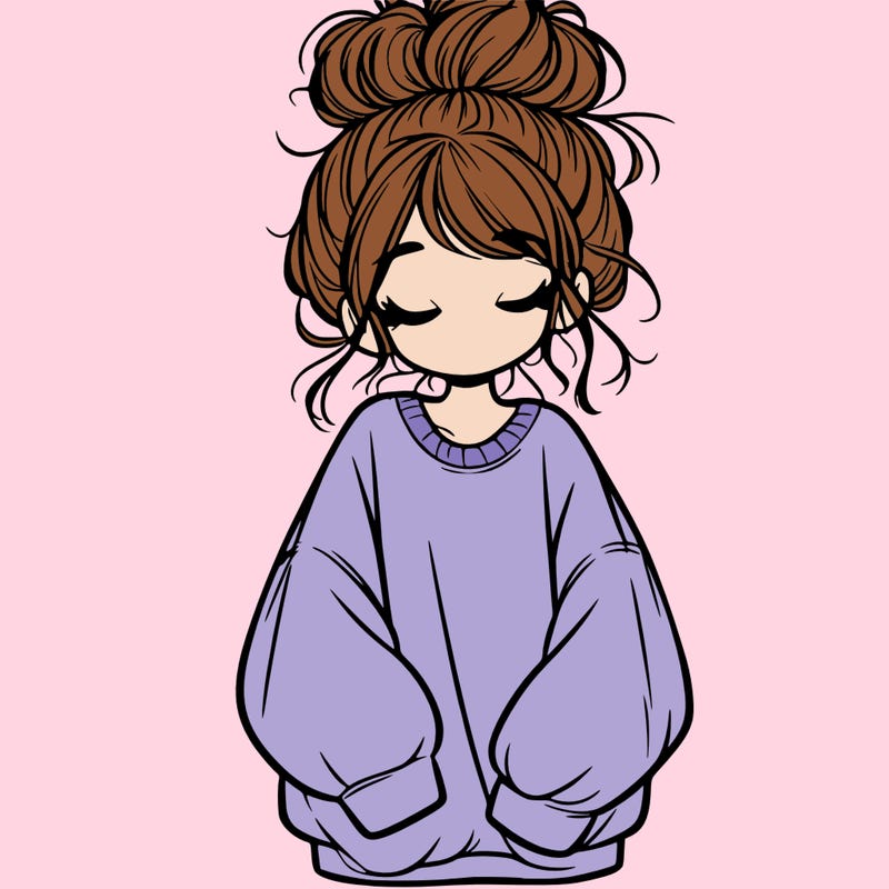 girl with baggy sweatshirt and messy bun