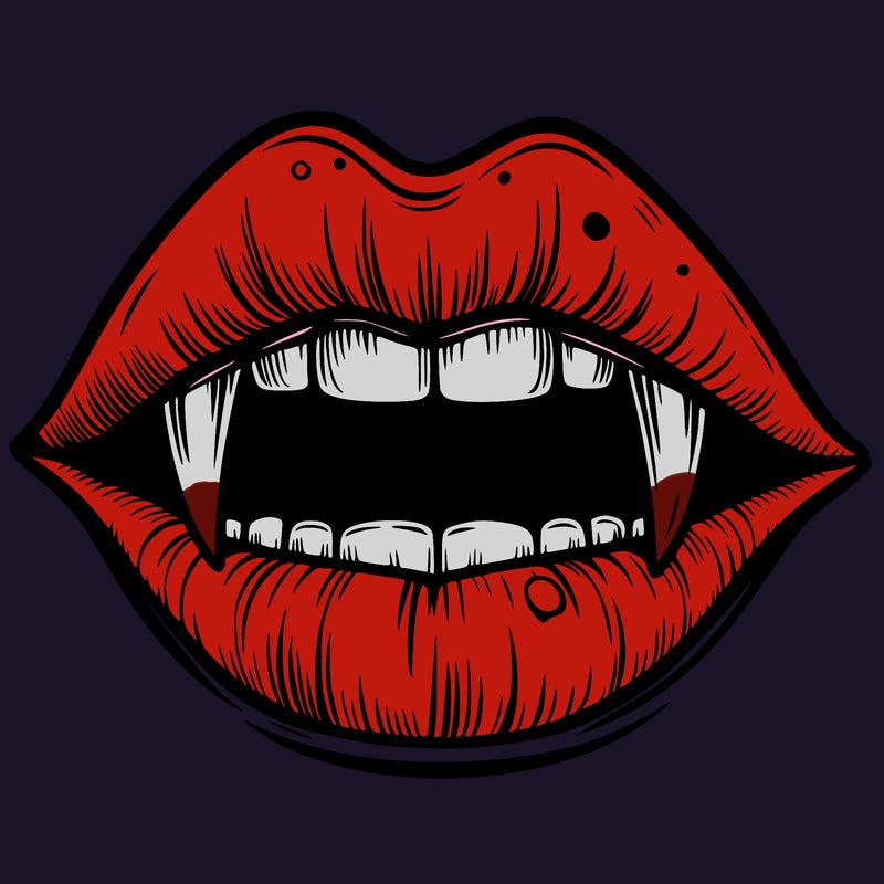 lips with vampire teeth