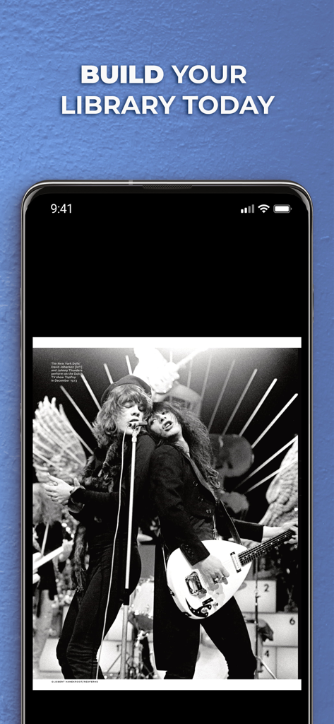 Guitar World Magazine - 今日のライブラリを構築するというテキストと共にロックミュージシャンの白黒写真を表示するスマートフォン上のGuitar World Magazineアプリ