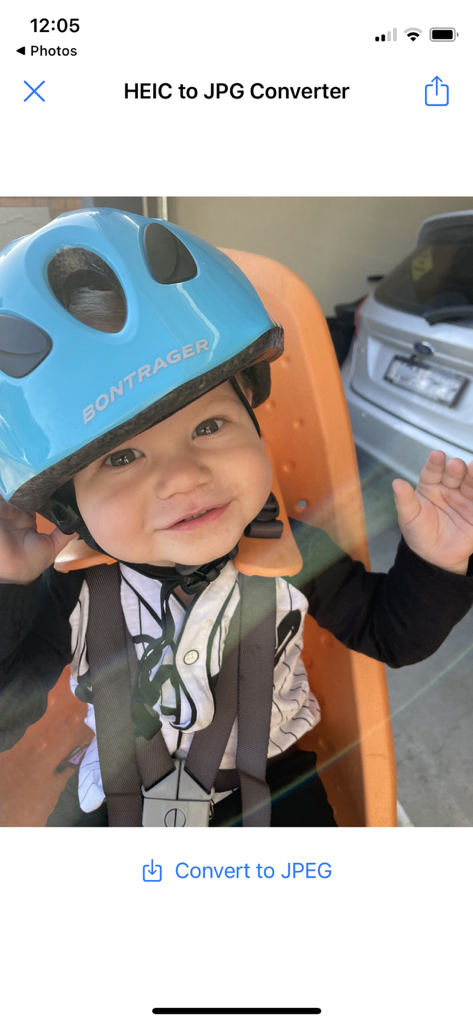 HEIC Converter: Image & Photo - HEICからJPEGへの変換ボタンが付いた赤ちゃんの写真を表示するモバイルアプリインターフェース