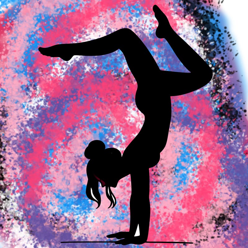 a woman doing a handstand