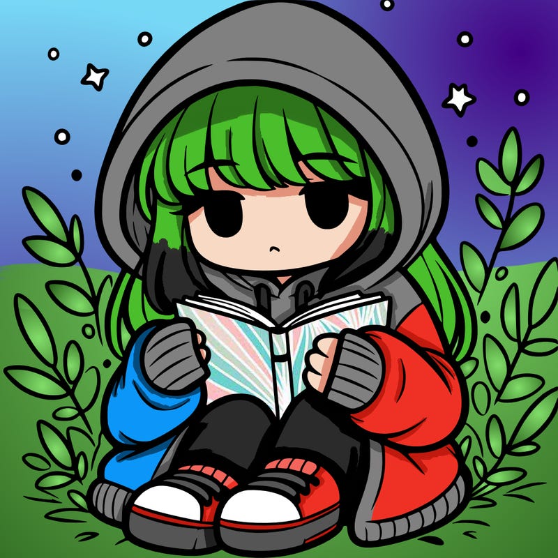 girl in oversized hoodie reading a book