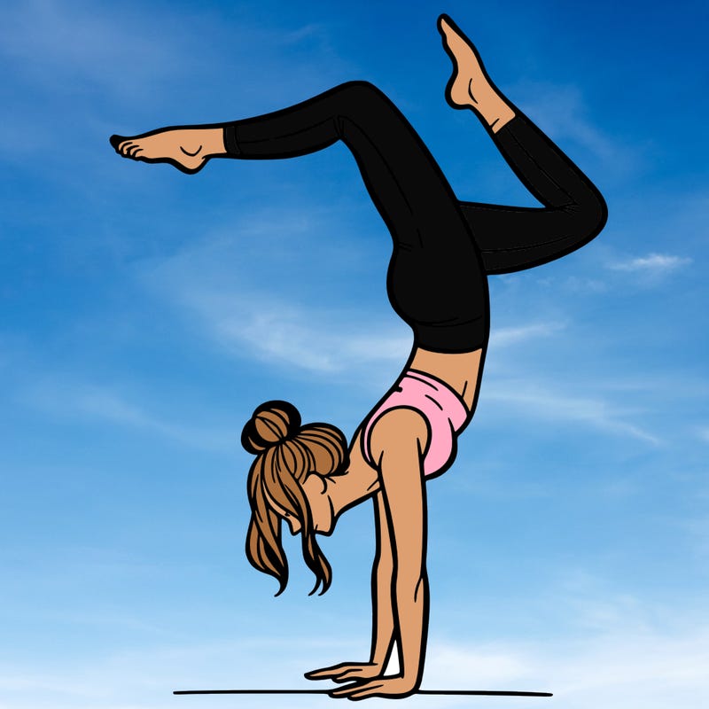 a woman doing a handstand