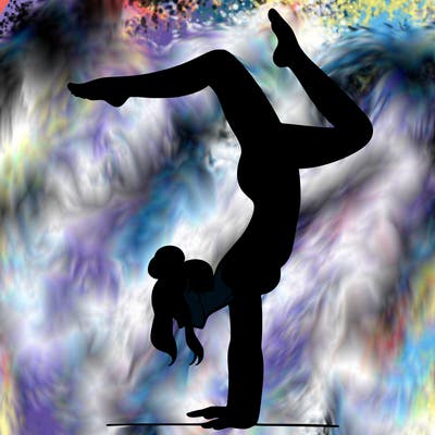 a woman doing a handstand