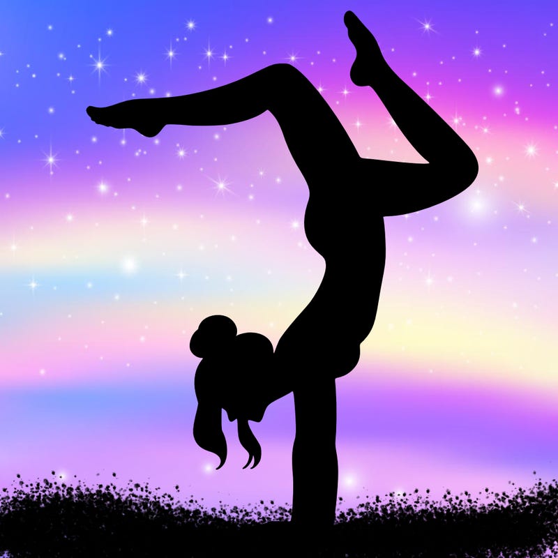 a woman doing a handstand