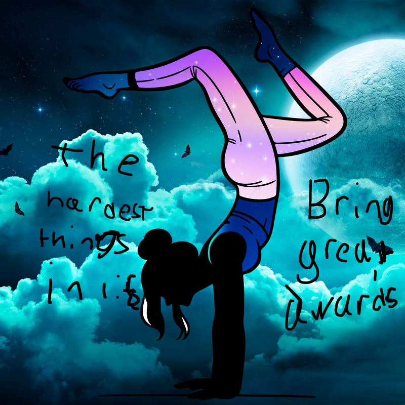 a woman doing a handstand