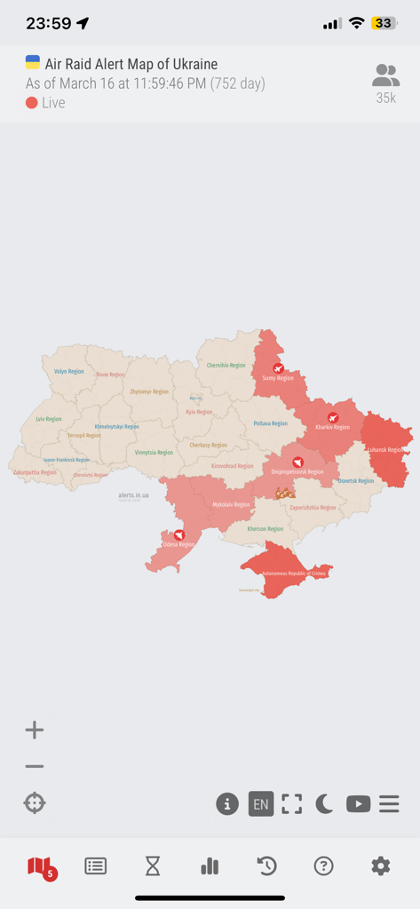 Real-time map of Ukraine showing air raid alerts with highlighted danger zones and aircraft icons