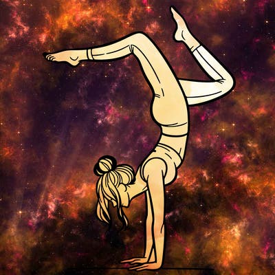 a woman doing a handstand