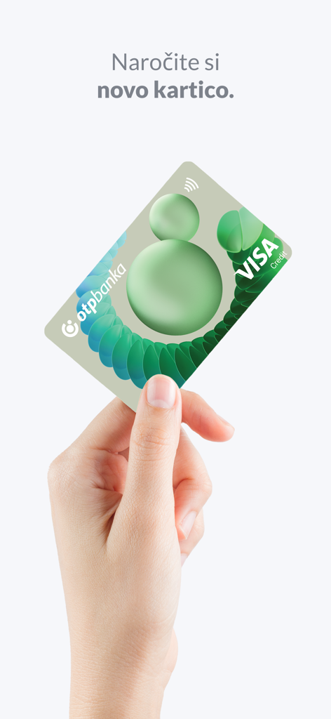 mBank@Net - A hand holding a green OTP banka VISA credit card to order within the mBank@Net app