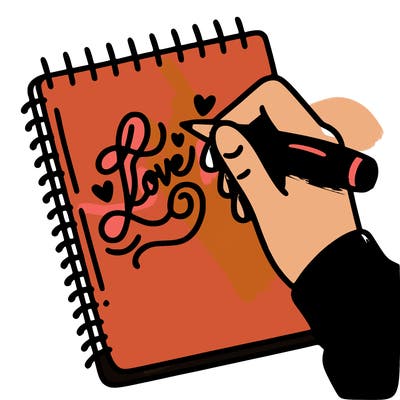 a hand writing “love” in calligraphy on a notebook