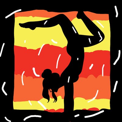 a woman doing a handstand