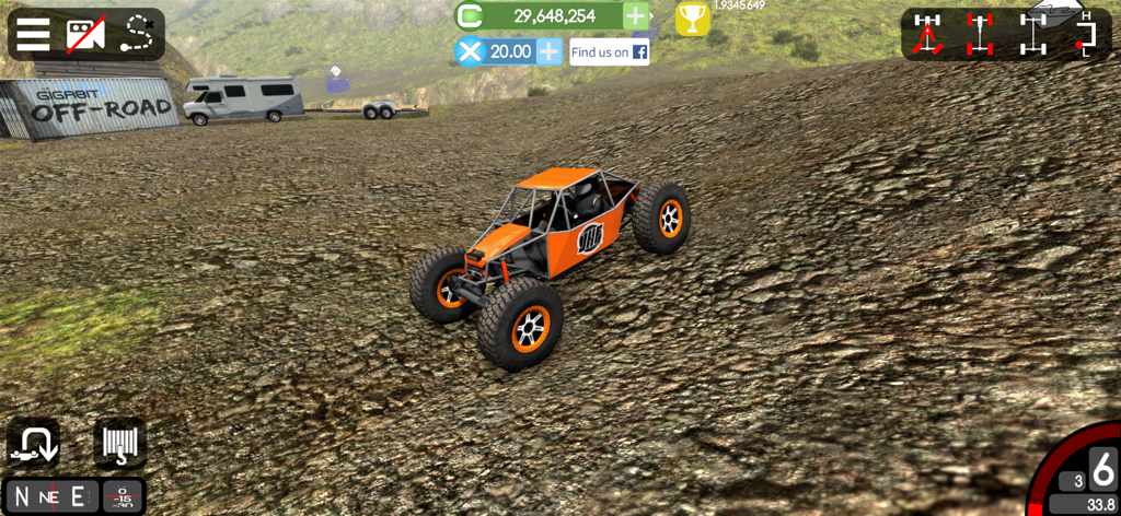 Gigabit Offroad - An orange rock crawler buggy navigating a steep rocky incline in Gigabit Offroad