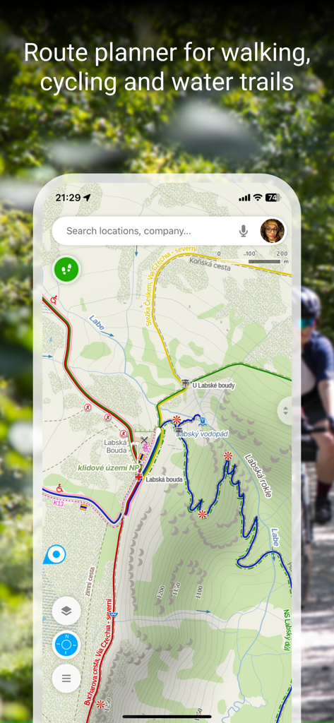 Mapy.com mobile app interface displaying a topographic map with highlighted hiking and cycling trails