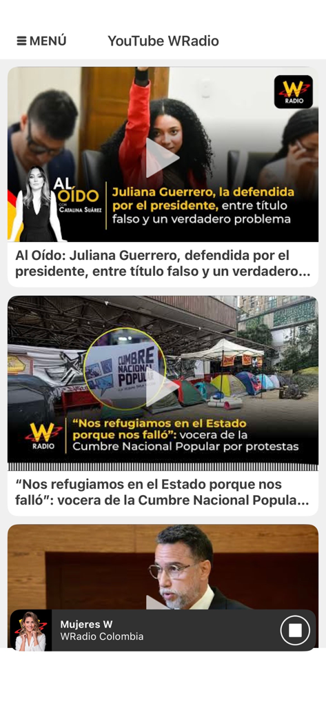 WRadio Colombia para iPhone - Interfaz de la aplicación W Radio Colombia que muestra un feed de videos de noticias con segmentos de análisis político y social.