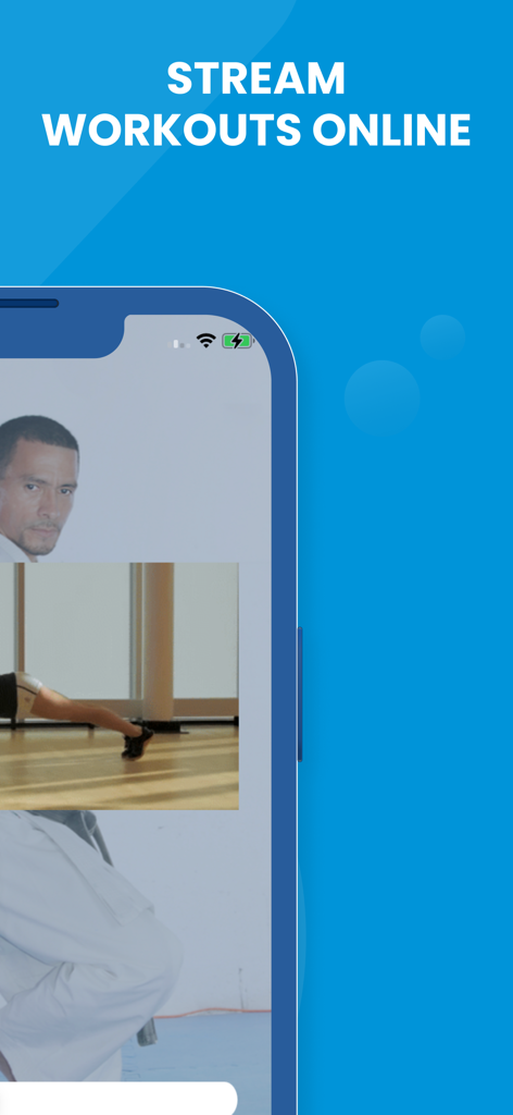 Muay Thai Training - A smartphone displaying a Muay Thai training video with the text Stream Workouts Online.