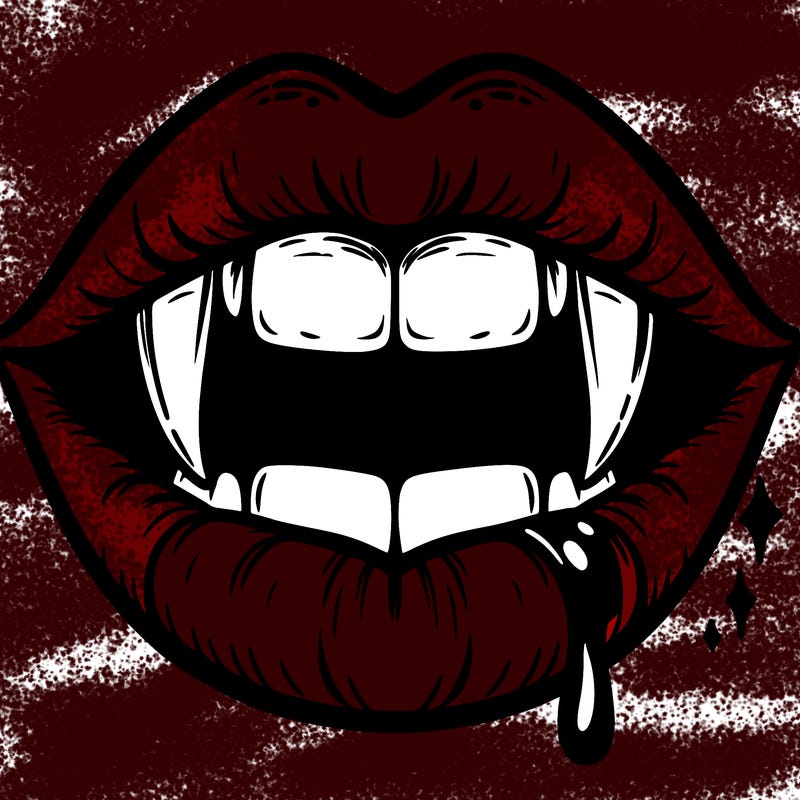 lips with vampire teeth