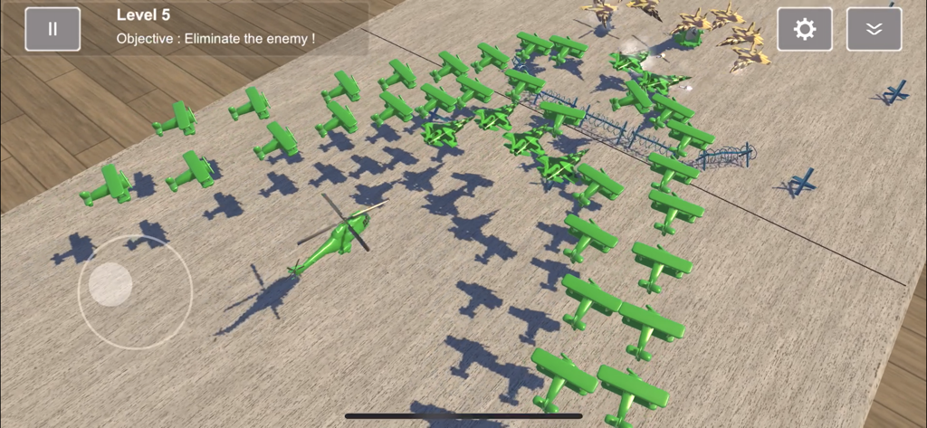 Toy green planes and a helicopter arranged for battle in a strategic simulation level