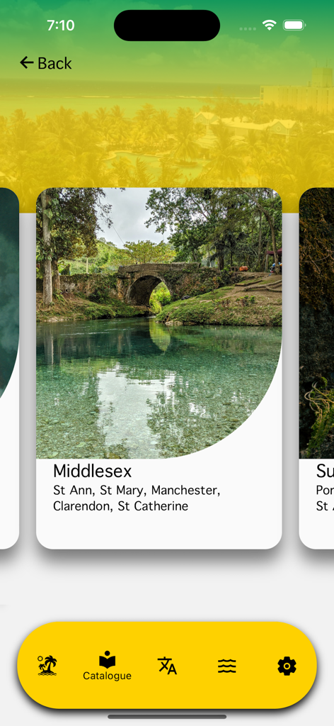 Pantalla de la aplicación JamrAAk que muestra el catálogo de la región de Middlesex con un pintoresco puente de piedra sobre un río