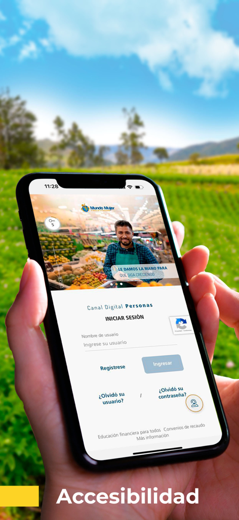 Banco Mundo Mujer - Tela de login do aplicativo móvel Banco Mundo Mujer exibida em um smartphone segurado em uma mão contra um fundo rural.