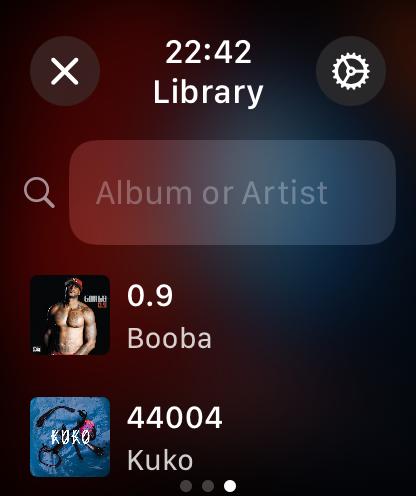 Music library screen of Finy Jellyfin client on Apple Watch featuring a search bar and album list
