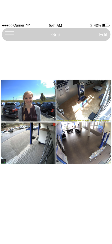 MOBOTIX LIVE - Grid view showing four different security camera feeds in the MOBOTIX LIVE mobile application