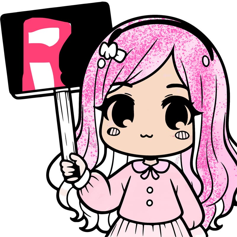 a girl holding a sign