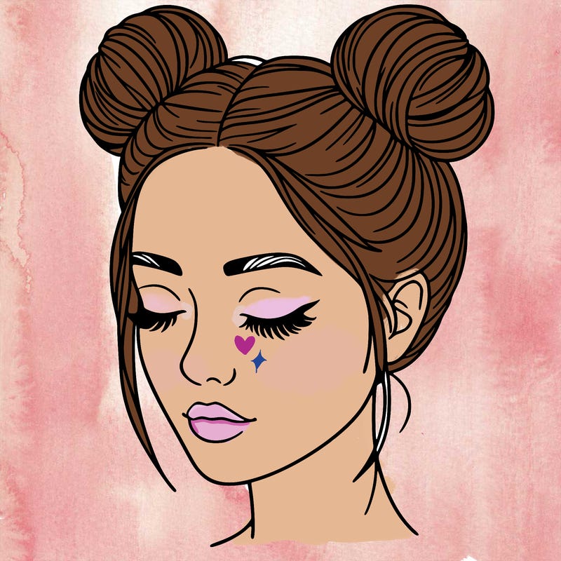 woman with hair buns