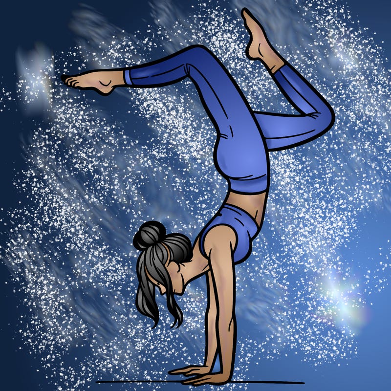 a woman doing a handstand