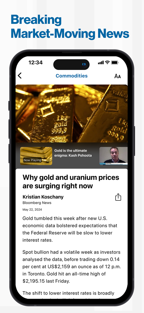 An iPhone screen displaying the BNN Bloomberg app with a breaking news article about gold and uranium price surges.