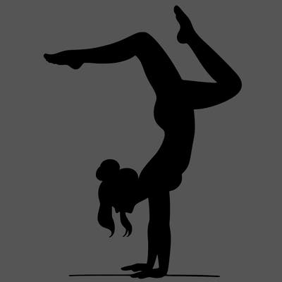 a woman doing a handstand