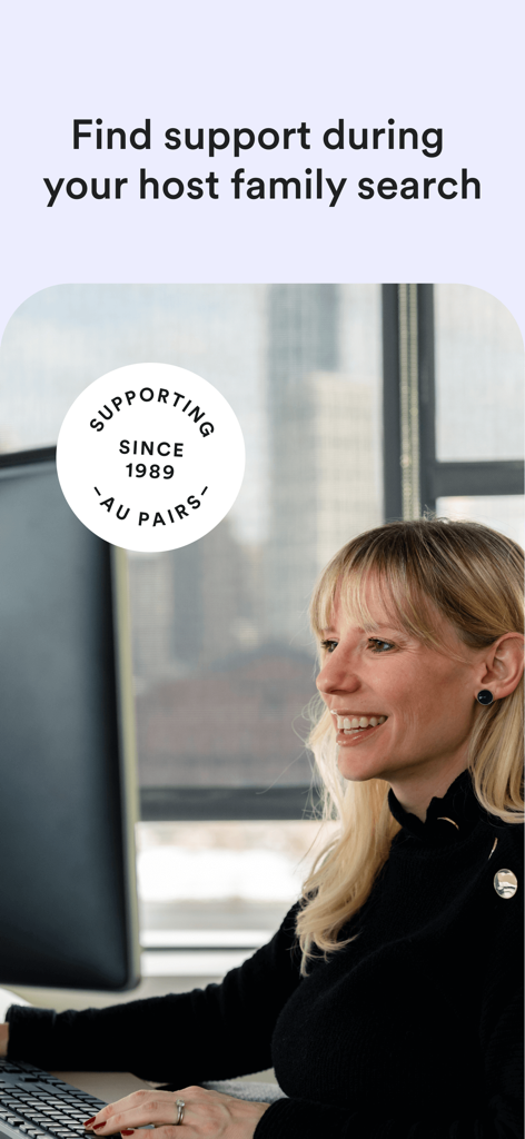 A supportive staff member assisting au pairs with their host family search