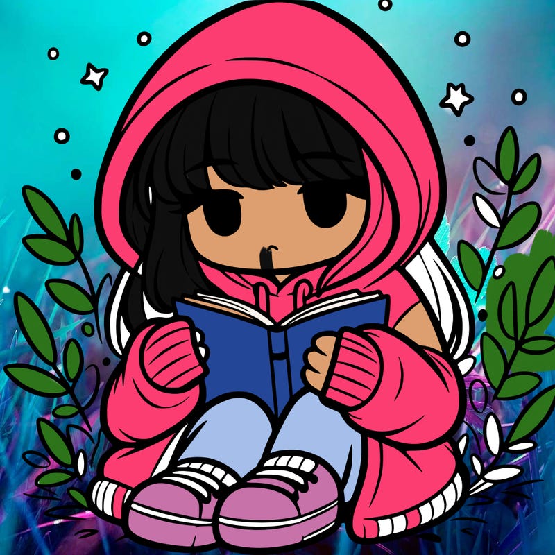 girl in oversized hoodie reading a book