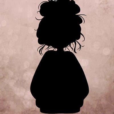 girl with baggy sweatshirt and messy bun